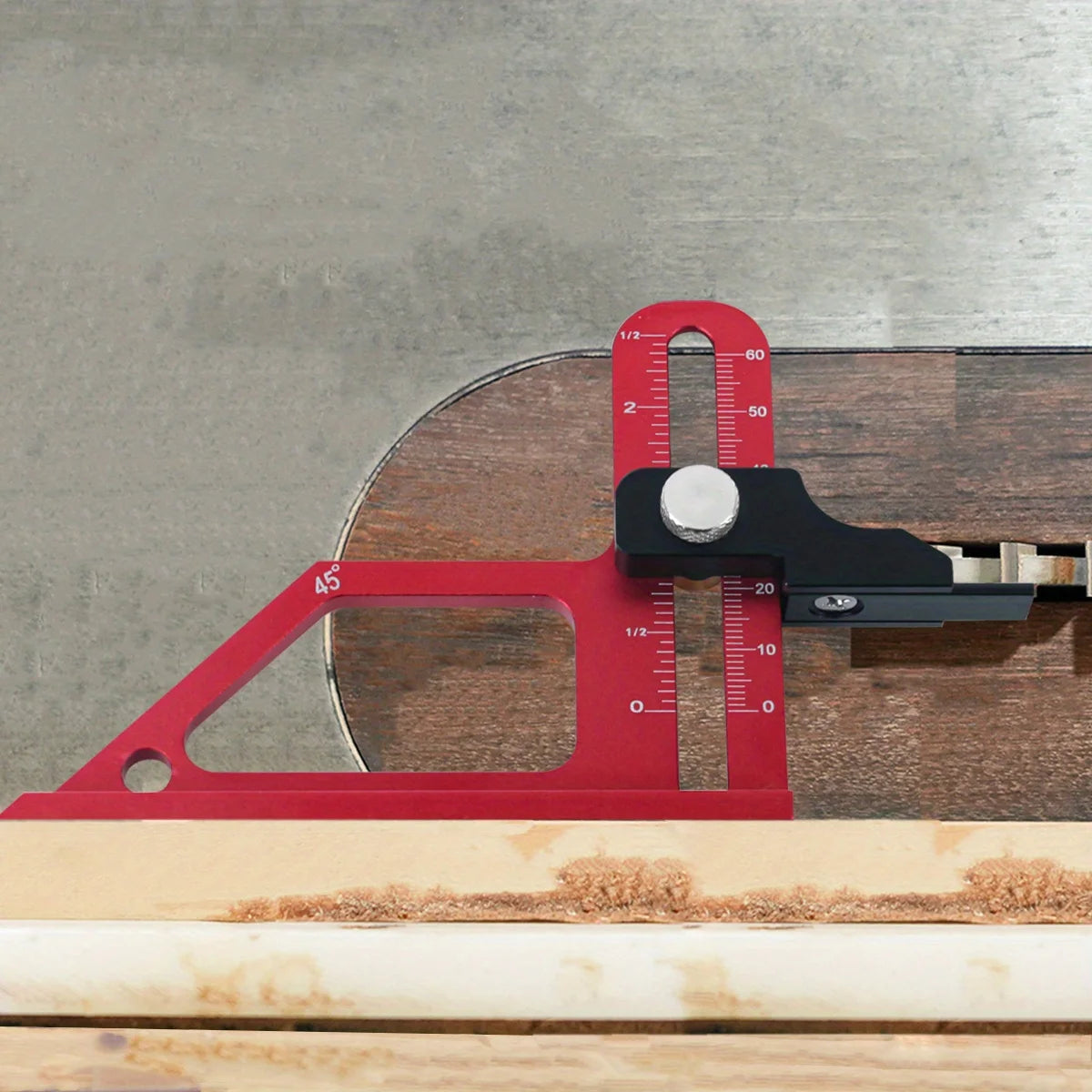 A red precision depth gauge with a black clamp is shown resting on a wooden surface.