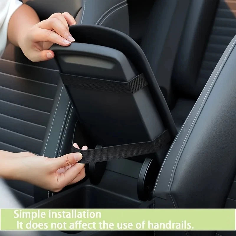 Hands install a black armrest cushion pad into a car seat for added support and scratch protection.