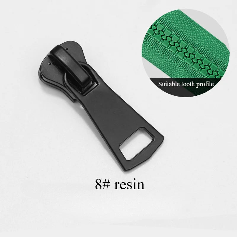 A black resin zipper slider repair kit with a suitable tooth profile is shown.