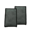 A pair of gray microfiber scrubbing sponges with black edges.