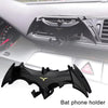 Black Bat shaped phone holder designed to fit into car vents