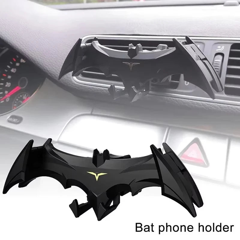 Black Bat shaped phone holder designed to fit into car vents