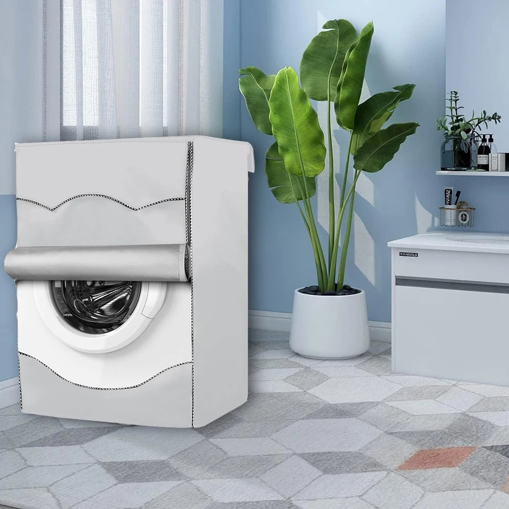 A white waterproof washing machine cover is shown next to a large green plant in a light blue room.