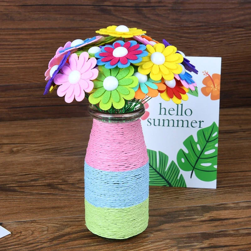 A colorful DIY flower bouquet craft kit featuring felt and buttons arranged in a glass jar.