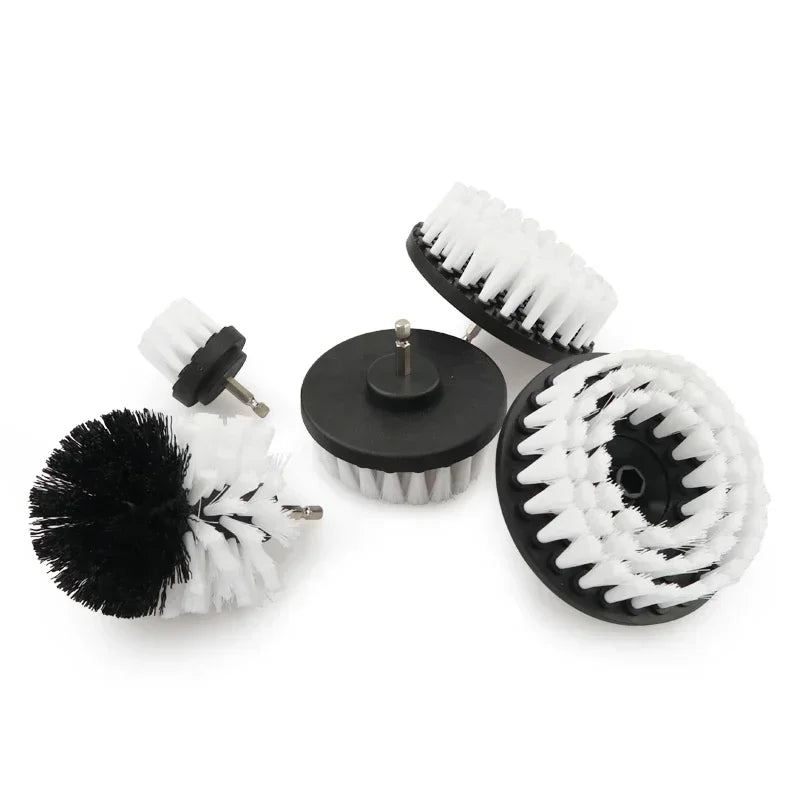 A set of black and white drill brushes for cleaning tiles, bathroom surfaces, and cars.