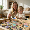 A woman and a young boy are playing with wooden magnetic fishing toys shaped like marine animals.