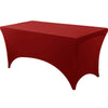 A solid red stretchable spandex tablecloth covering a rectangular table.