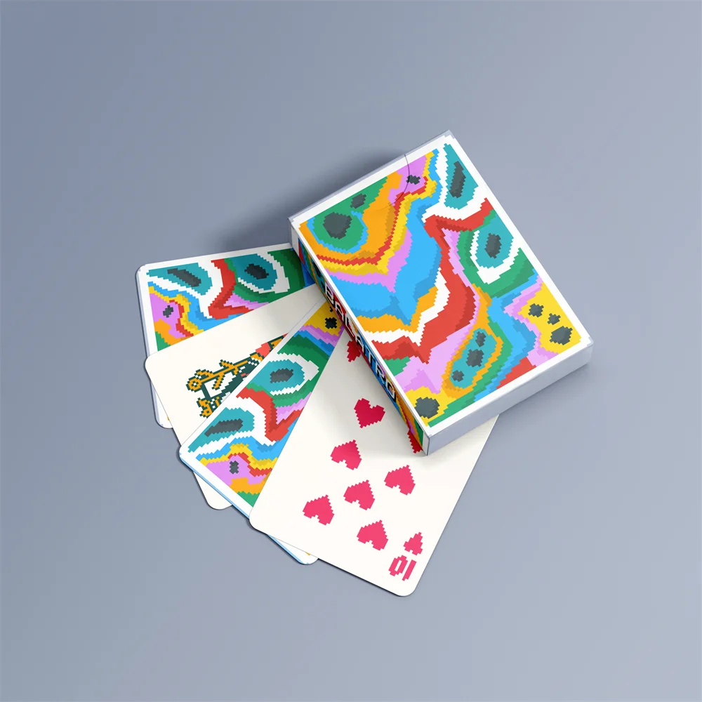 A colorful classic poker card set displayed in its box, showing various patterned cards.
