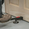 A heavy-duty steel door lift tool is shown resting on a light gray floor next to a wooden door frame.