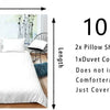 A white duvet cover set with a Wild Safari animal print design shown next to a bed.