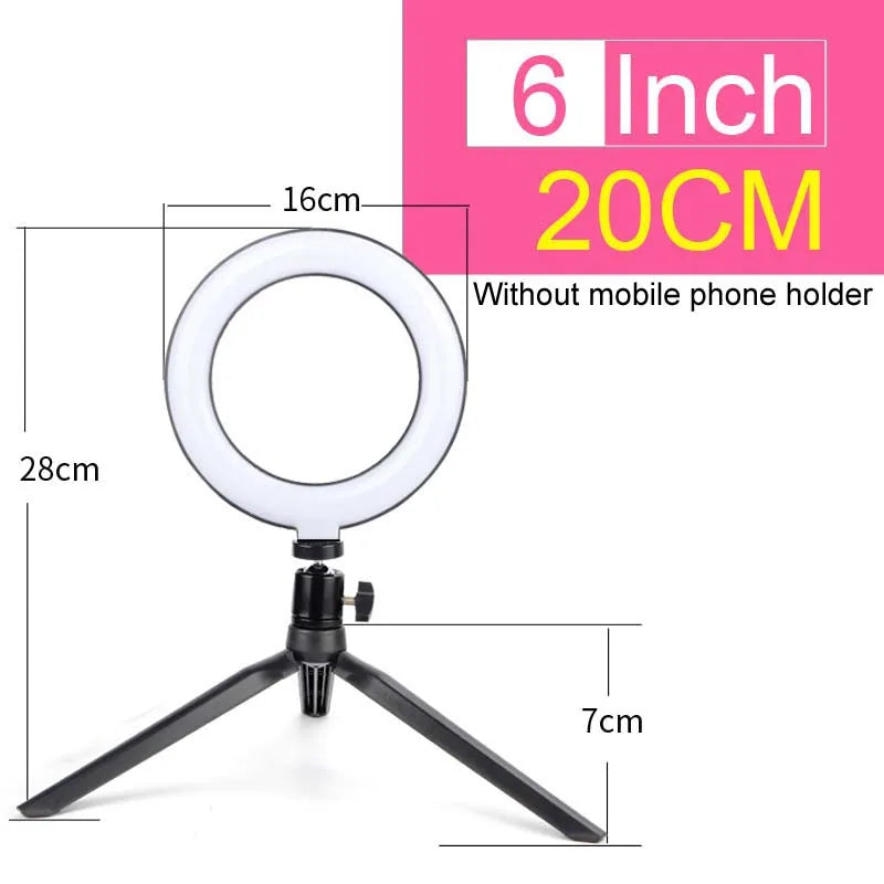 A white adjustable ring light with a tripod stand and mounting for mobile phones.