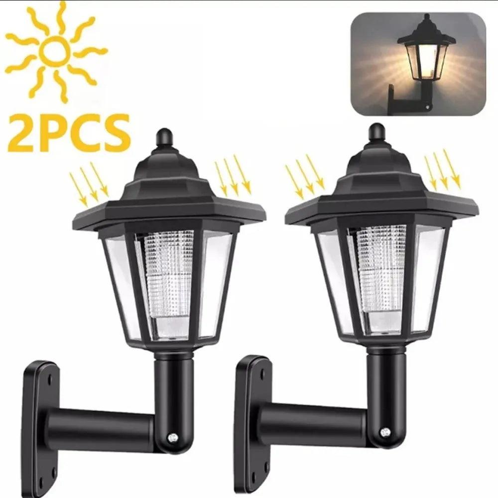 Two black solar-powered LED wall lights with glass globes shown against a light background.