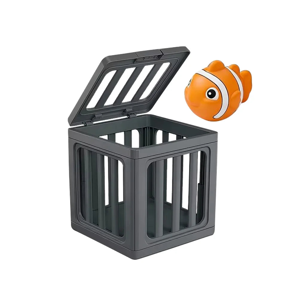 A gray plastic diving toy box with a floating orange fish figure.