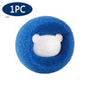 One reusable blue laundry ball with a white panda face for pet hair and lint removal