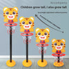 A set of four adjustable kids basketball hoops featuring cartoon tiger designs and red nets on yellow bases.