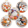 A collection of cross stitch kits featuring seasonal themes like pumpkins, autumn foliage, and witches.