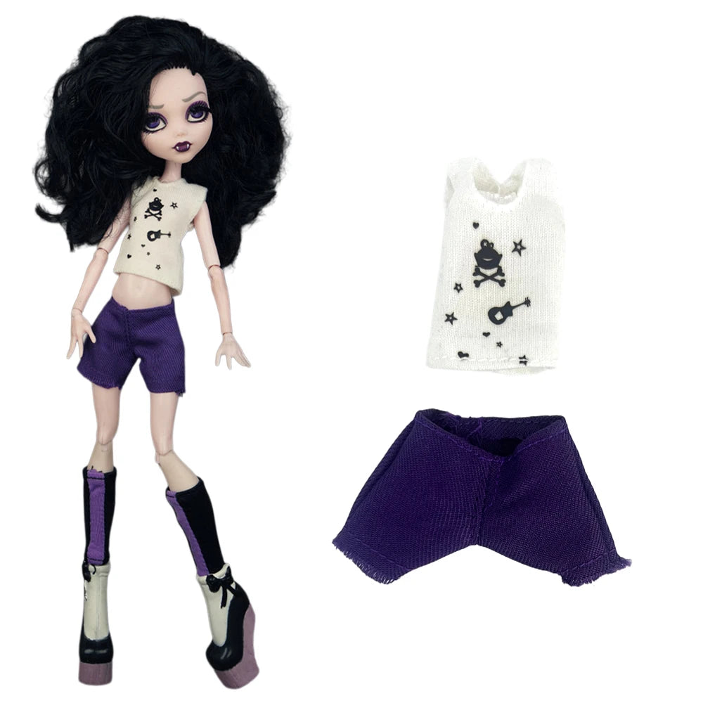 A fashion doll outfit featuring a light beige top, purple shorts, and a purple sweater.