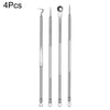 A set of four stainless steel acne and blackhead removal tools.