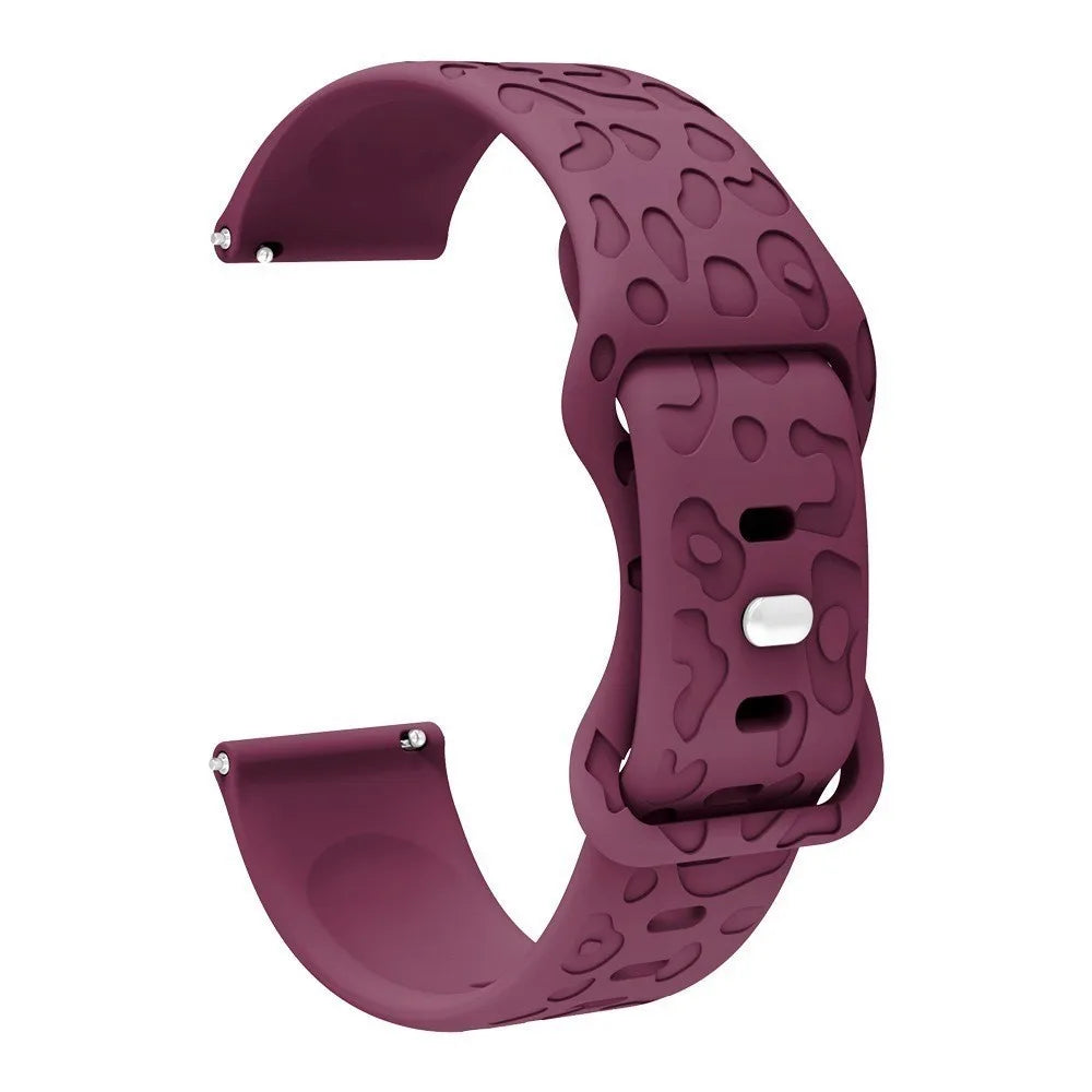 A close-up view of a purple silicone watch band for a Redmi Watch 5.