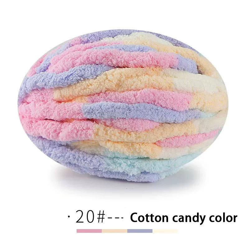 A ball of multi-colored cotton candy yarn showing various pastel shades like pink, purple, and blue.