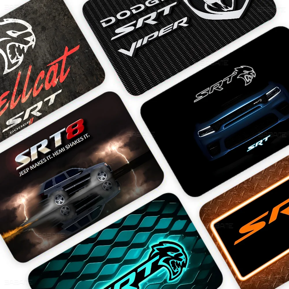 A collection of black and orange credit card skin covers featuring SRT branding, including a Dodge Hellcat theme.