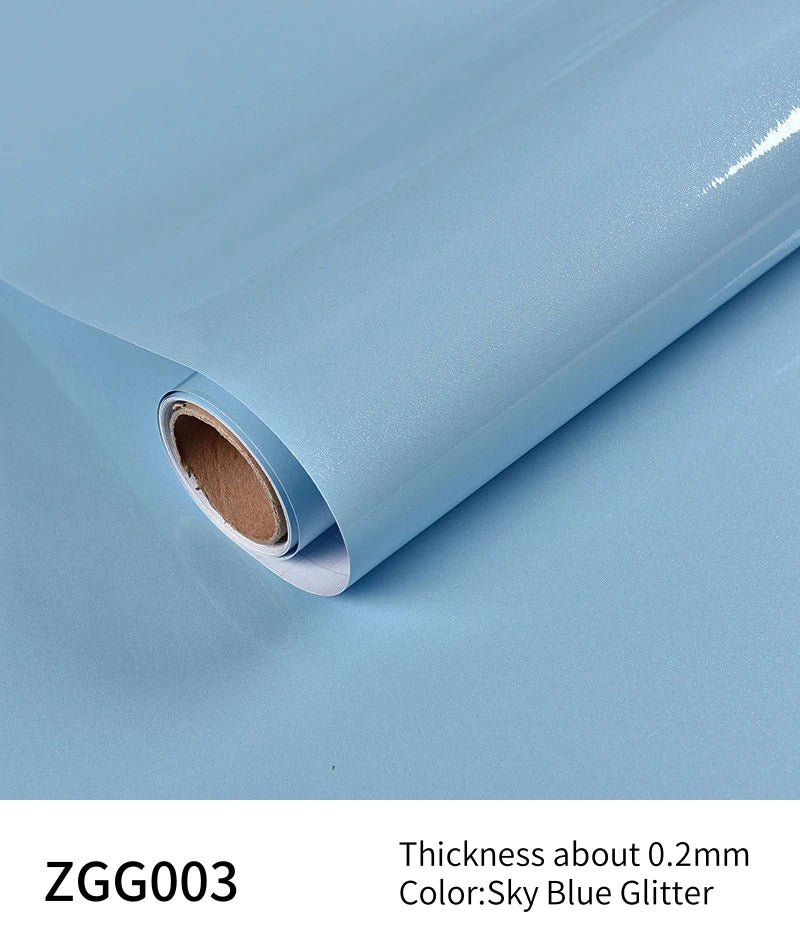 Roll of sky blue glitter peel-and-stick vinyl contact paper