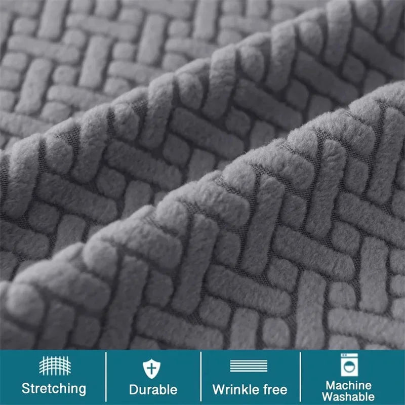 Close-up texture of a gray jacquard bar stool slipcover showing a woven pattern and elastic edge.