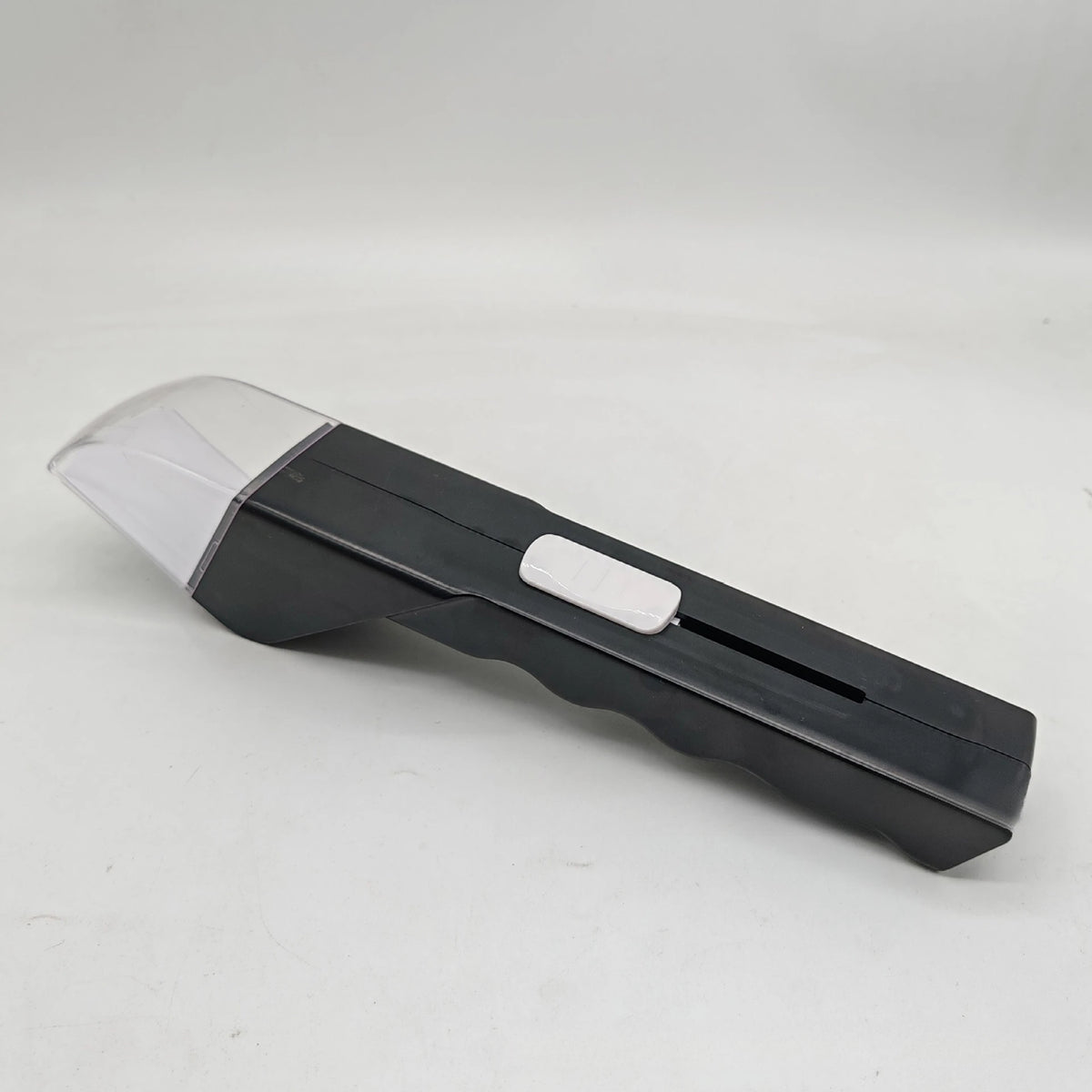 A black handheld insect catcher with a clear plastic collection chamber and a white grip is shown on a white background.