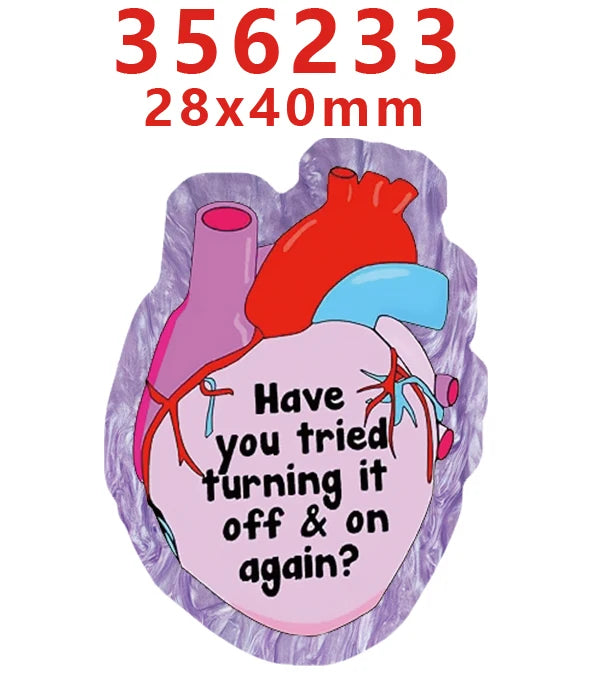 A set of glitter acrylic nurse badge charms featuring a heart and a blood vessel design.