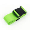 A bright lime green adjustable polyester luggage strap with a black buckle.