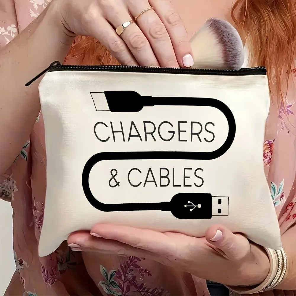 A beige canvas storage pouch with black text reading Chargers & Cables is held by a person.
