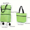 A lime green foldable rolling shopping bag with black straps and wheels.