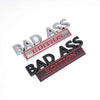 A set of three 3D metal chrome badge emblems with the text BAD ASS EDITION on a black and silver background.