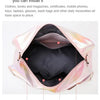 Pink travel duffel bag showing interior compartments for organizing various daily necessities.
