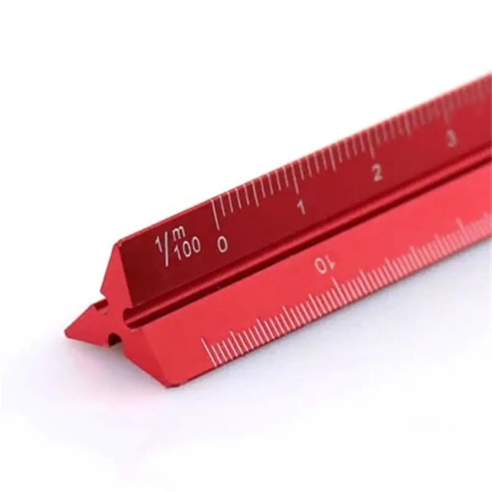 A red precision aluminum triangular scale ruler showing markings up to 3 inches.