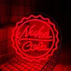 A red neon sign shaped like a bottle cap for Nuka Cola is illuminated against a dark background.