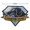 Embroidered patch featuring a black dog head within a shield shape with the text Diamond Dogs