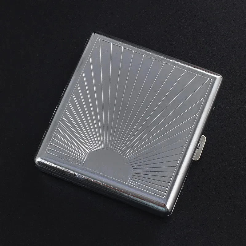 A silver stainless steel cigarette case with an embossed sunburst pattern shown from above.