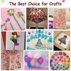 A collection of colorful removable double-sided adhesive dots used for DIY crafts and party decor.