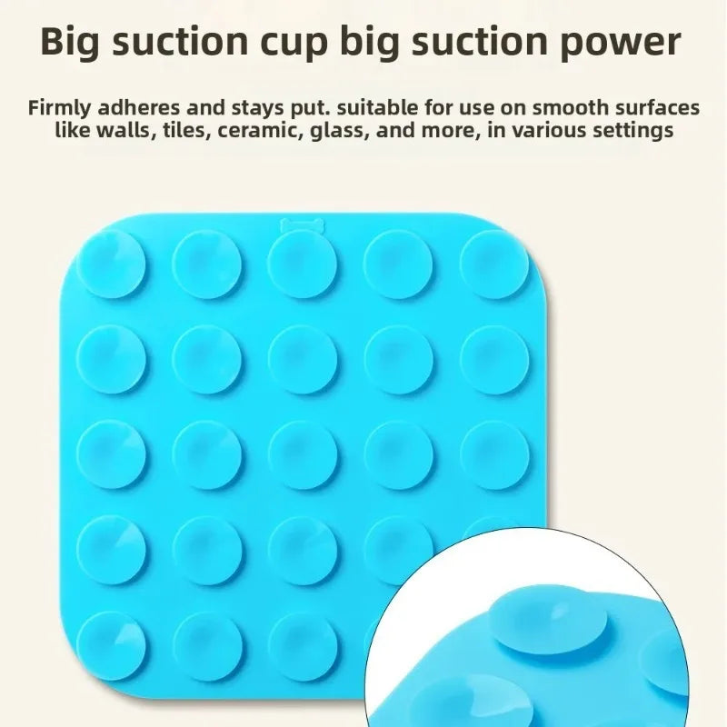 Blue silicone suction cup mat for pets featuring multiple suction cups