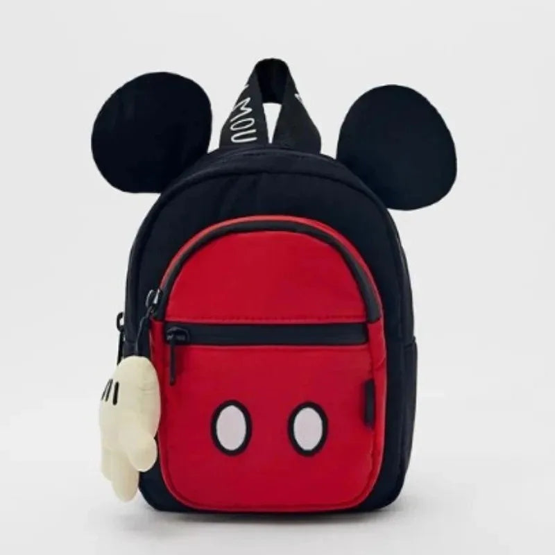 A red backpack featuring a cow print design and white accents, shown from the back.