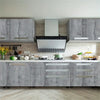 Modern kitchen cabinetry with gray wood grain panels and stainless steel appliances.