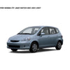 A side view of a light blue Honda Fit Jazz hatchback with smoke window deflectors installed.