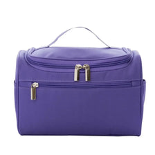 A purple waterproof hanging makeup bag with a zipper and gold hardware.