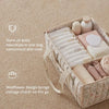A floral diaper organizer bag with multiple compartments holding baby essentials like wipes and creams.