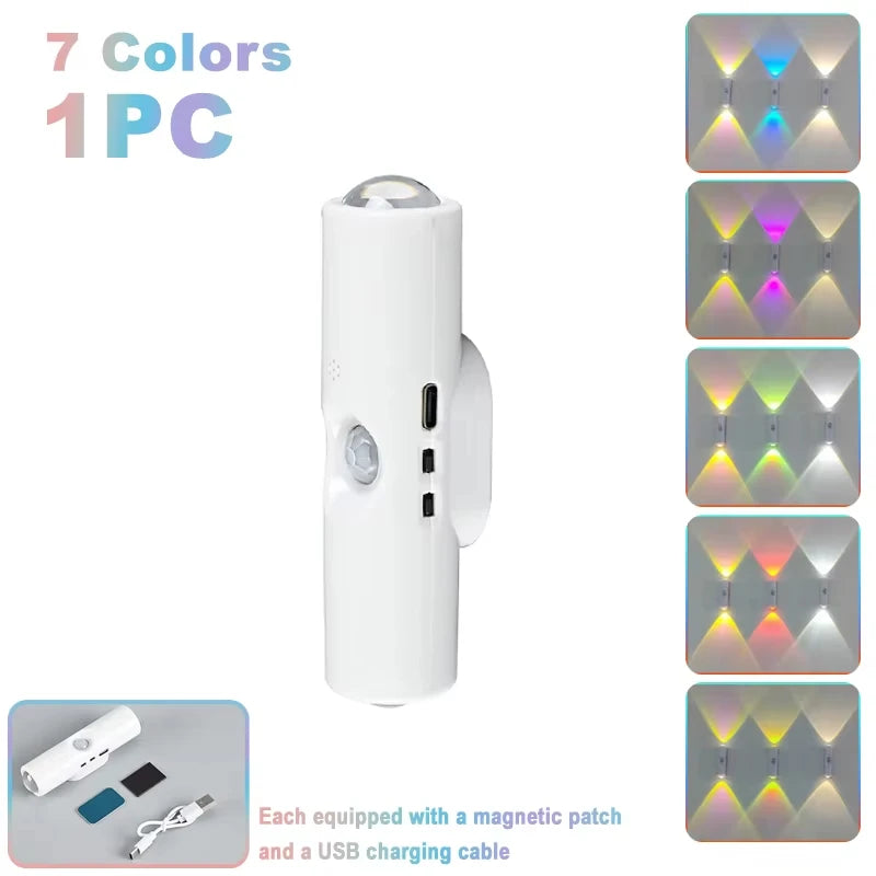A white rechargeable motion sensor LED night light with RGB mood lighting and a USB charging cable.