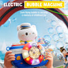 A child's hand holds a camera-shaped bubble machine with a floating white animal and colorful bubbles in a reflection.
