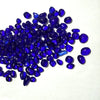 A pile of small, deep blue decorative stone pebbles for terrariums and aquariums.