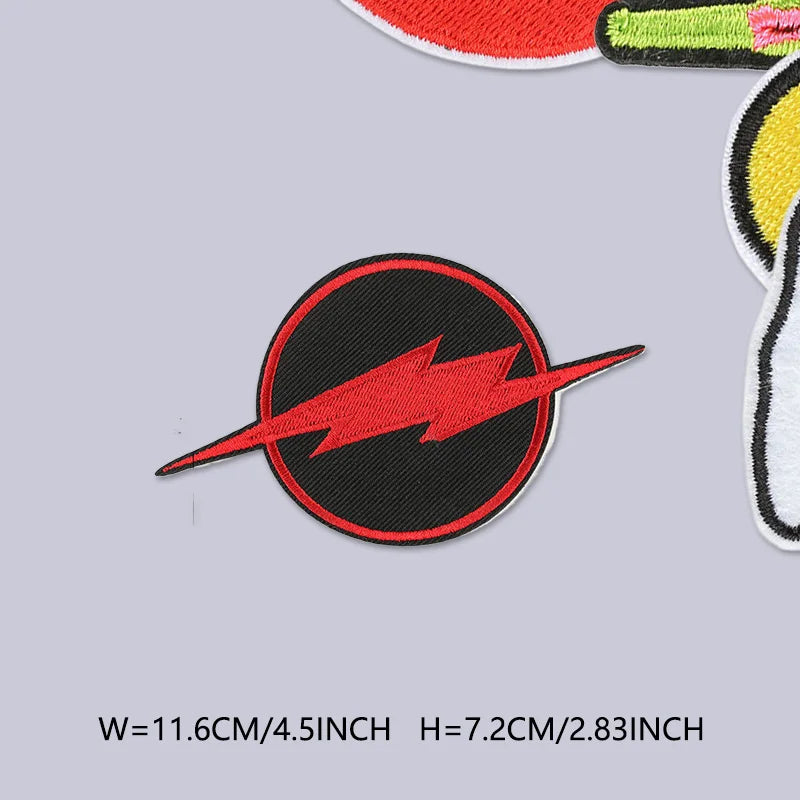 Black circular iron-on embroidered patch featuring a red lightning bolt design