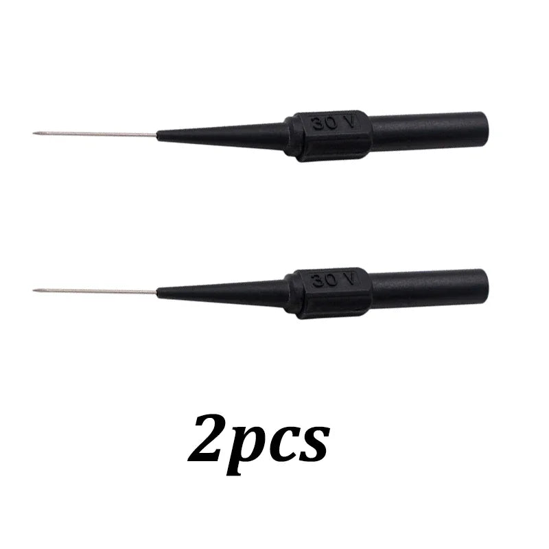 Two black multimeter back-piercing test probes with 30V markings and needle tips.